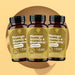 Tre flaconi di Moringa Ananas e Bromelina RedMoringa da 60 capsule, confezione da 3 su sfondo giallo